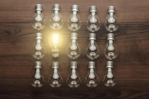 Glowing bulb uniqueness concept Stock Photos