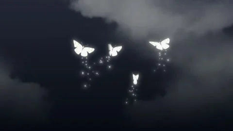 Glowing butterflies fluttering through dark stormy clouds creating magical Video stock 343552420