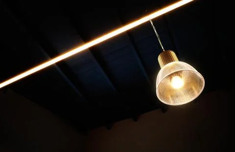 Glowing cafe lamp interior background Foto stock