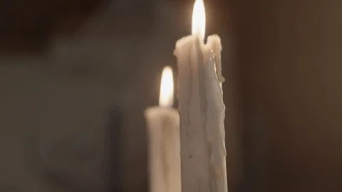 Glowing candles in dark Stock Footage 123235595