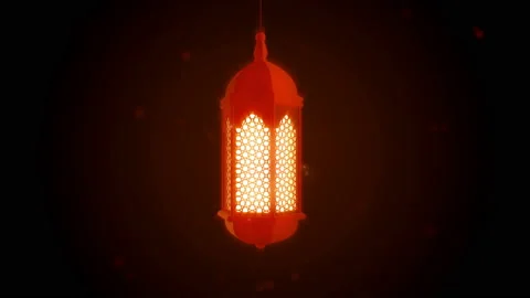 Glowing celebration lantern hanging from ceiling on dark background. Stock Footage 105285921