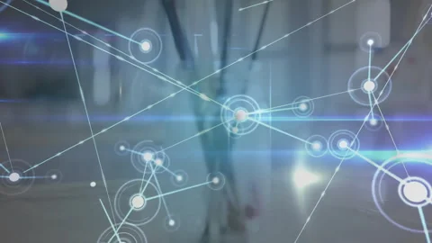 Glowing central node appearing forming network showing data overlay on desk by Stock Footage 312280549