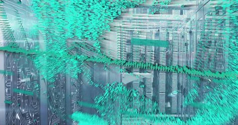 Glowing central server racks reflecting teal data visualization across data c 스톡 사진