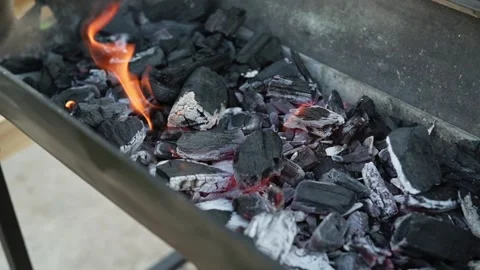 Glowing charcoal in the grill Video stock 260133886