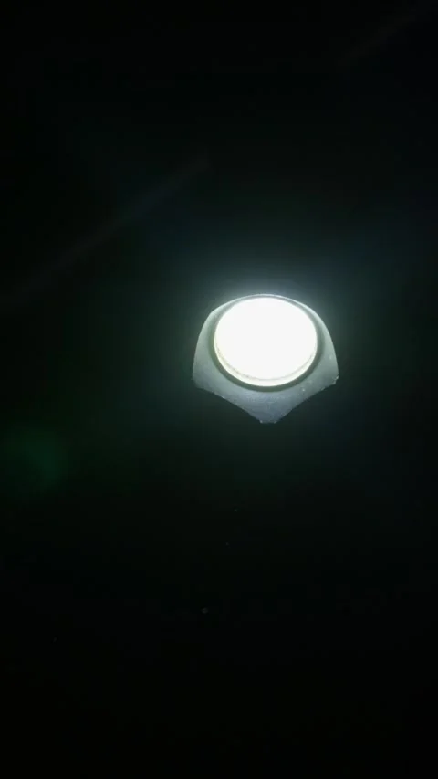 Glowing Circular Led Light Shining Brightly in Darkness Vertical View Vidéo 345168947