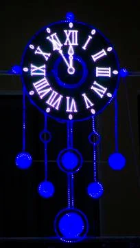 Glowing clock Stockfoto's