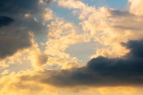 Glowing clouds on evening sky Stock-Fotos