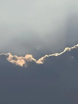 Glowing Cloudscape with Subtle Sun Rays Stock Photos