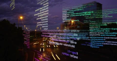 Glowing code columns drifting over urban highway at dusk, with moving vehicle 스톡 사진