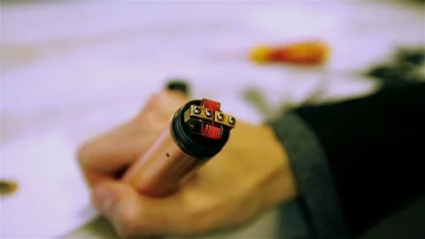 Glowing coils of the electronic cigarette. Stock Footage 73178010