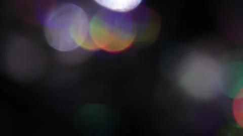Glowing colored bokeh lights Stock Footage 318729733