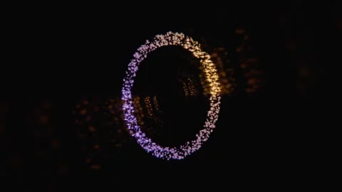 Glowing concentric particle rings forming an abstract tunnel Stock Footage 346658270