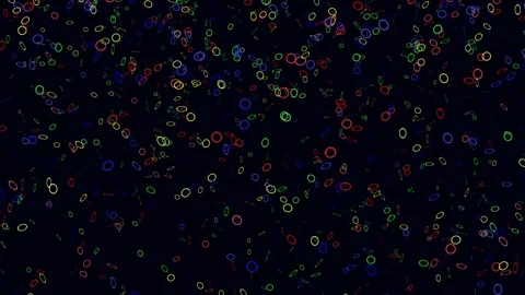 Glowing confetti on a dark background. Stock Footage 142301945
