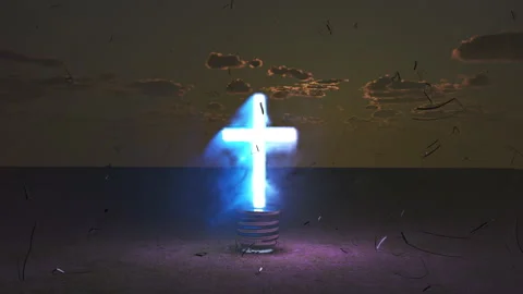 Glowing Cross in Lightbulb Explodes into Blue Spiritual Flame at Sunset 動画素材 340983293