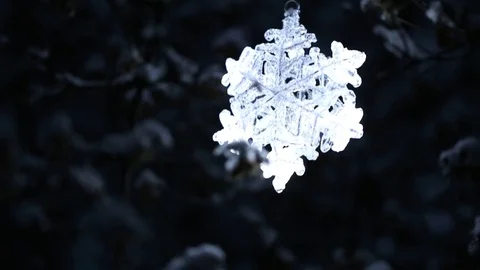 Glowing in the dark snowflake. Christmas  concept Stock Footage 76070846