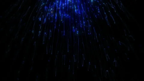 Glowing defocused blue wavy particles falling down on black background. Stock Footage 238712937