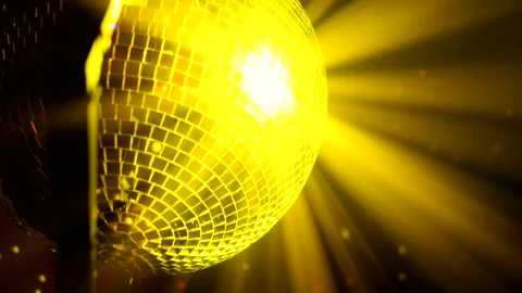 Glowing Disco Ball Reflecting Light at a Party Stock Footage 345694291