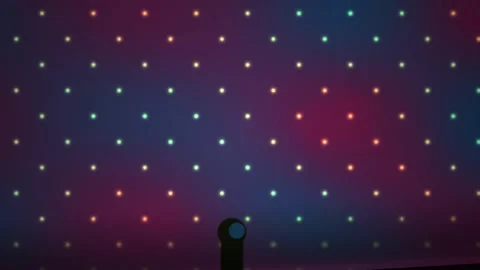 Glowing dots on dark background with silhouette. Stock Footage 337507373