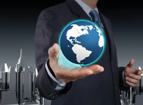 A glowing earth globe in his hands Stock Photos