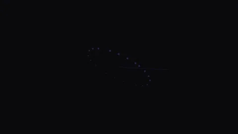 A glowing elliptical ring of blue lights set against a deep black background Stock Footage 339617660