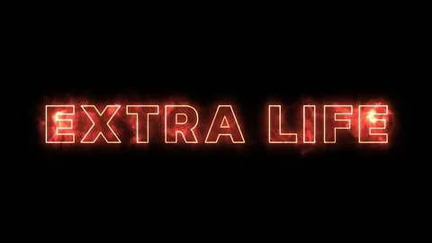 Glowing Extra Life Text Animation with Fiery Particle Effects on a Dark Stock Footage 339167199