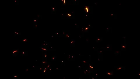 Glowing fire embers floating in dark night air for overlay effect and cinematic Stock Footage 347770254