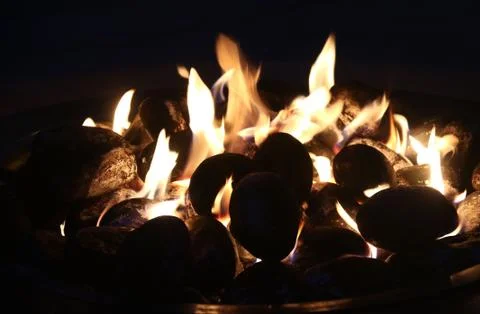 Glowing fire pit in the evening Foto stock