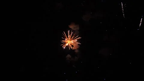 Glowing firework patterns performance in dark night sky on holiday event Video stock 267069077