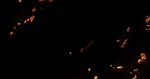 Glowing flashes, explosions passing through thin threads on a black background Stock Footage 244007378