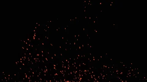 Glowing flying ember, burning ash particles. Video stock 169035825