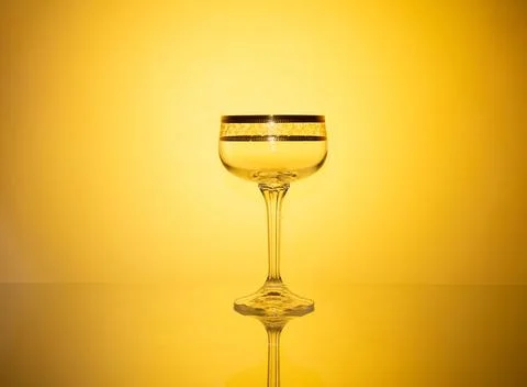 Glowing glassware composition infused with dynamic colored lighting effects Stock Photos