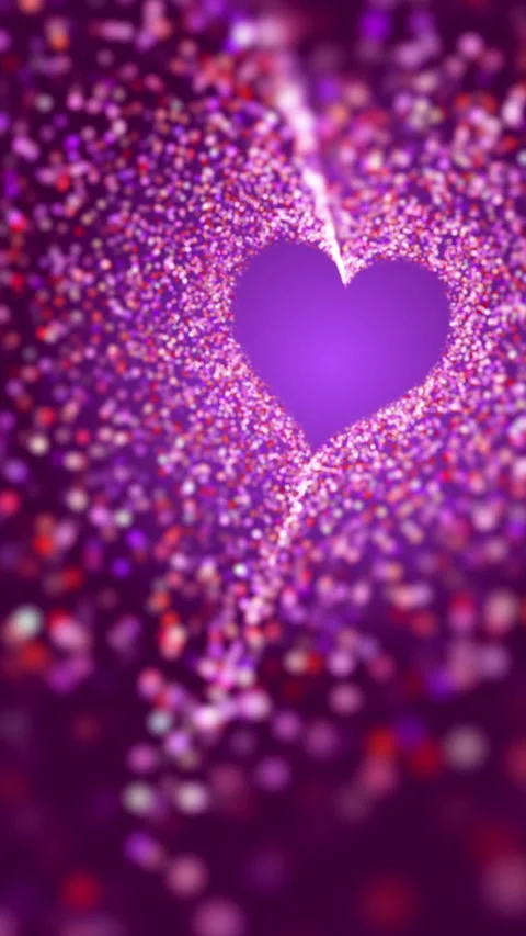 Glowing glitter heart shape with shine particles on purple background. Loop 스톡 동영상 279567491