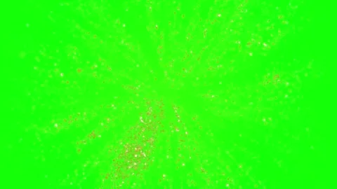 Glowing gold particles explode on green background Stock Footage 338174846
