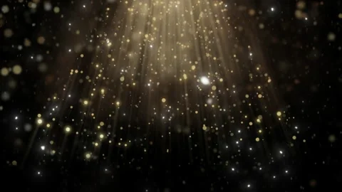 Glowing gold particles floating slowly in light rays creating a magical and eleg Stock Footage 335667064