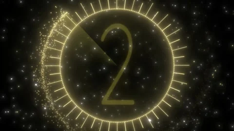 Glowing golden countdown timer with particle dust effects floating against a 스톡 동영상 343815423