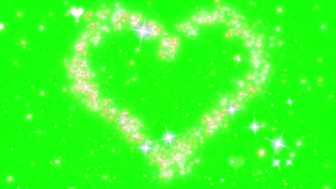 Glowing golden heart shape made of sparkling particles on a green screen Stock Footage 345016802