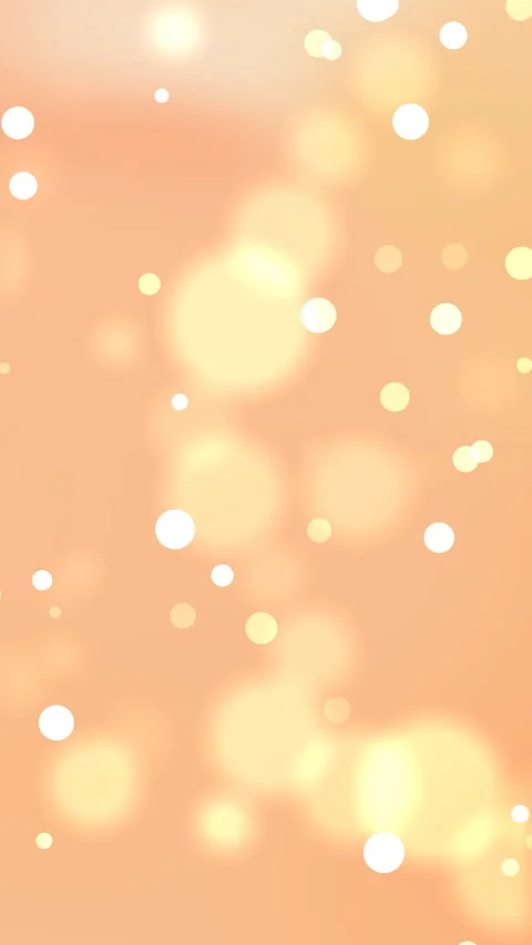 Glowing Golden Light Orbs Drifting on Soft Peach Background Video stock 334493055