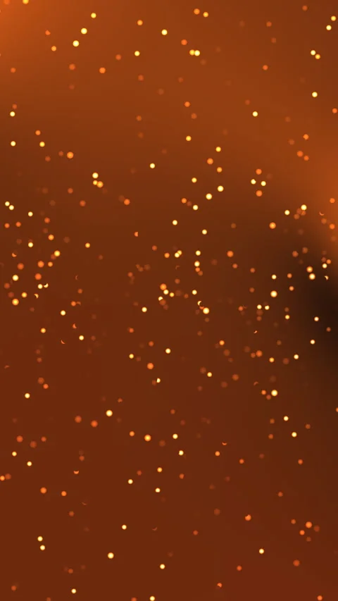 Glowing Golden Particles Floating Across Warm Orange Abstract Background Видео 333980088