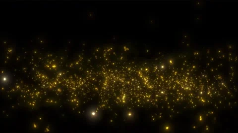 Glowing golden particles shimmering in a dark abstract field 库存影片 346426224