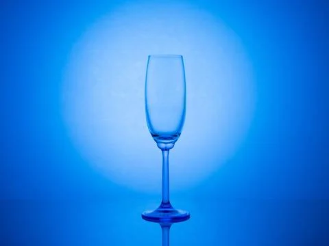 Glowing gradient backdrop accentuates elegantly presented glassware in crea.. Stock Photos