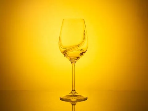 Glowing gradient backdrop enhances the elegance of glassware in creative phot Stock Photos