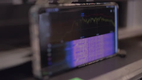 Glowing graph of an equalizer display. Waveform loop and meter. Close up Stock Footage 147156692