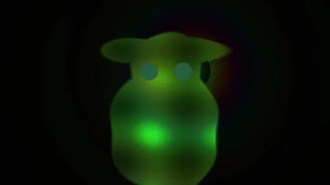 Glowing green alien creature in dark. Stock Footage 337507433