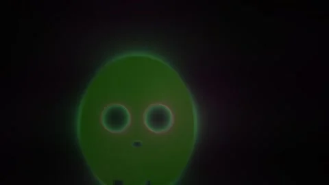 Glowing green alien face animation. Stock Footage 334336913