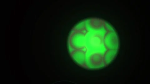 Glowing green cell under microscope. Stock Footage 337507698