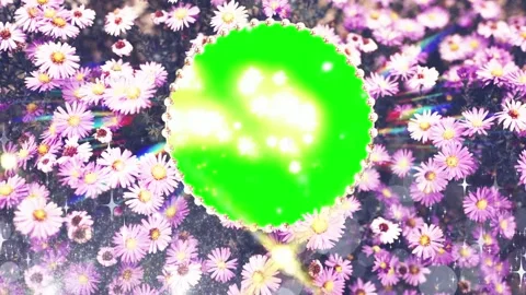 Glowing Green Circle Overlay with Floating Sparkles over a Field of Purple Stock Footage 338325875