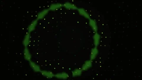 Glowing green circle with white dots on black background. Stock Footage 337464326