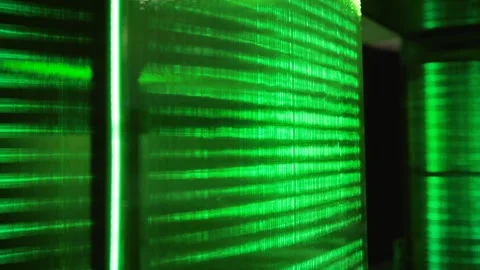 Glowing green digital display and light streaks on dark background Stock Footage 333868244