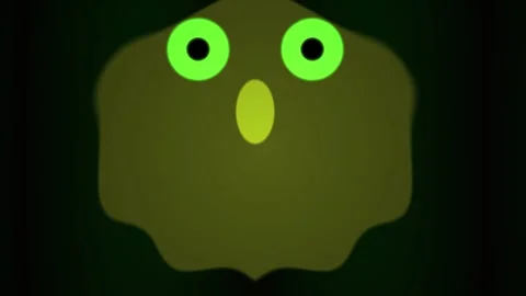 Glowing green eyes in dark background. Video stock 336232443