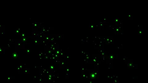Glowing green glitter particles moving on black background Stock Footage 302475341